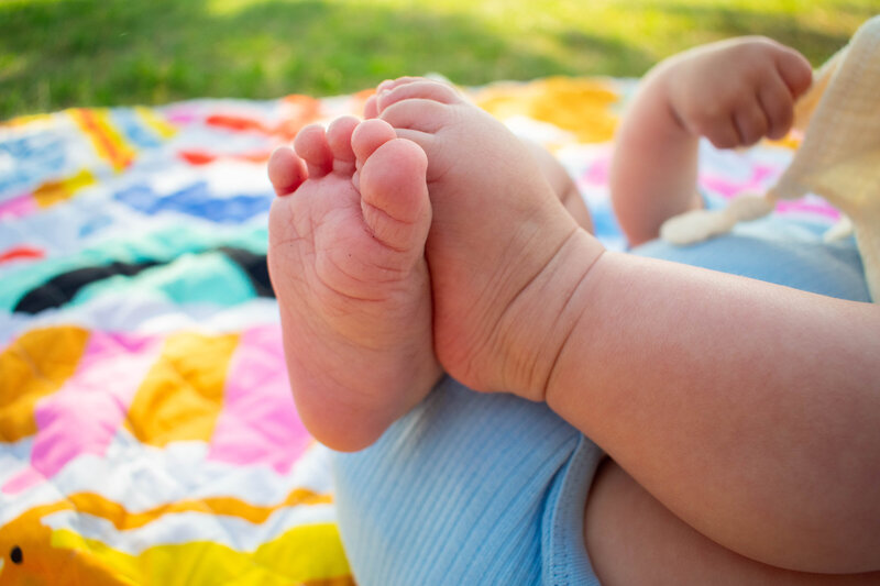 Baby feet on mat