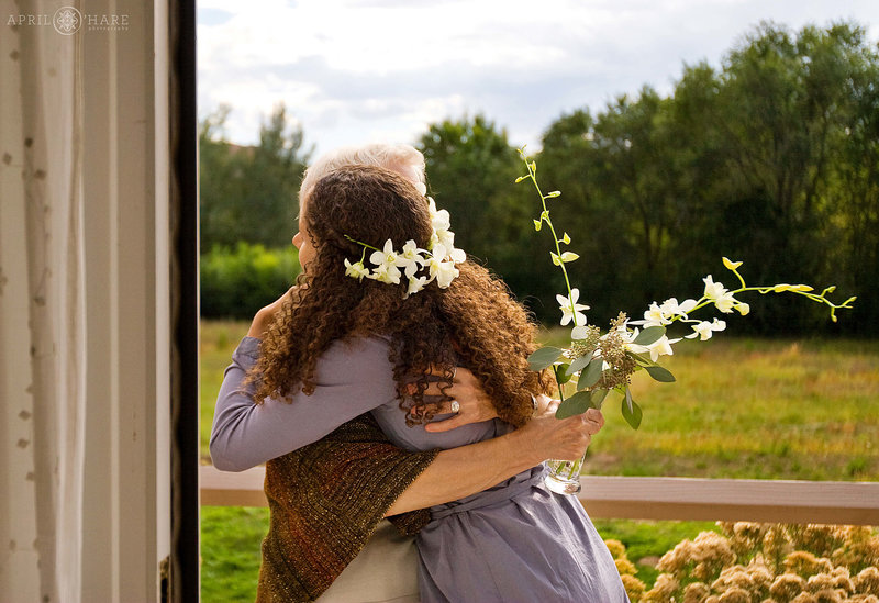 Bride hugs her mom on her wedding day at Rancho Manzana near Santa Fe New Mexico