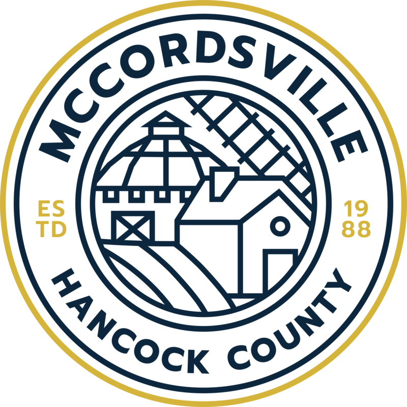 Town seal for McCordsville with barn and house and railroad