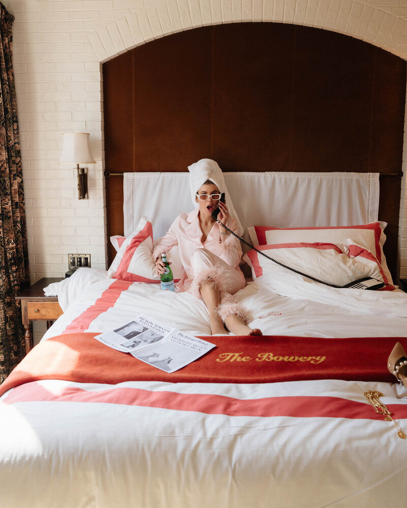 The Salesgirls looking through books at a desk