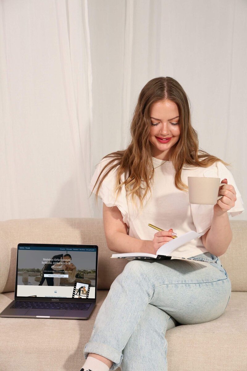 maiju taking notes on her notebook