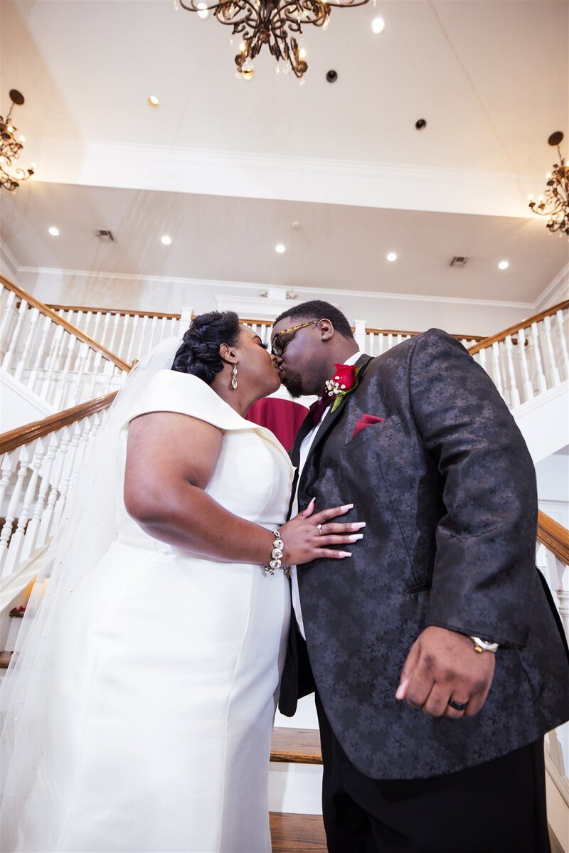 First Kiss taken by Dallas wedding photographer Jameson Ray