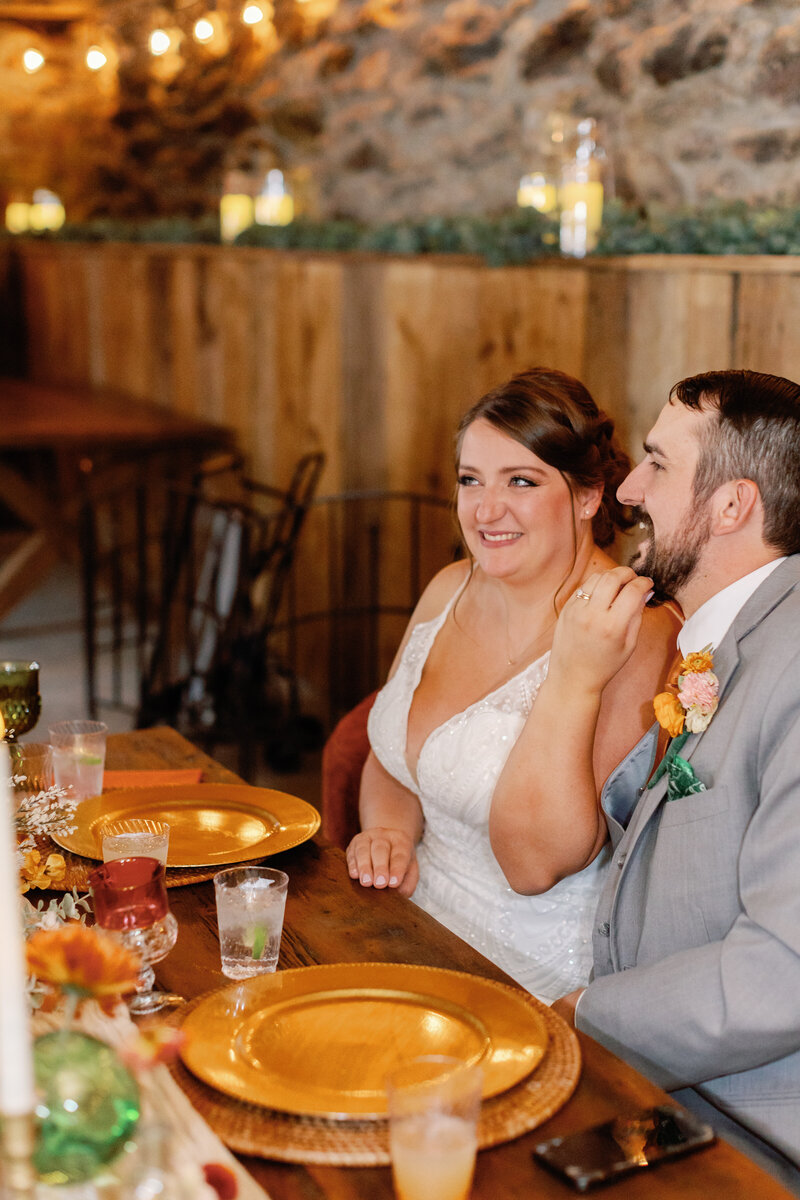 A bride embracing the groom inside the Hummingbird chateau in Maryland