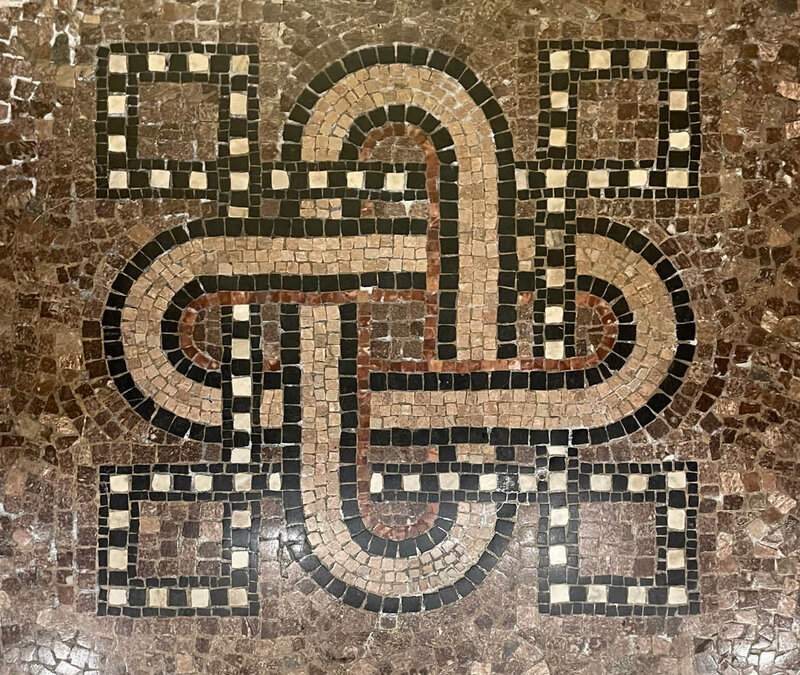 Historic homes design photo tours in old buildings vintage mosaic tile flooring showcases Flagler Mansion in St. Augustine, Florida, with original historic tiles.