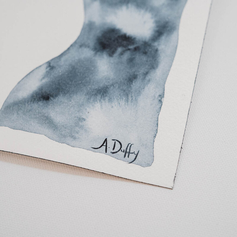 Signature of artist Amy Duffy on a watercolor painting