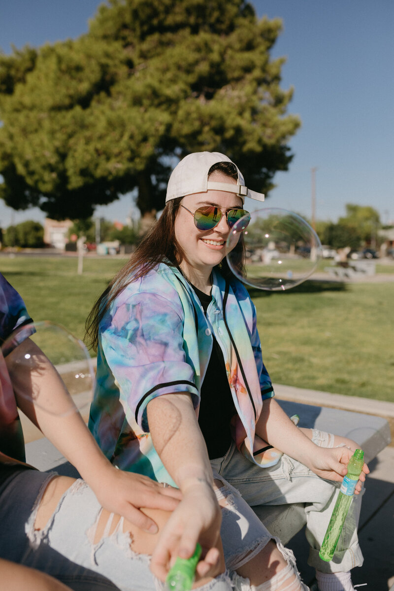 Girl blowing a bubble