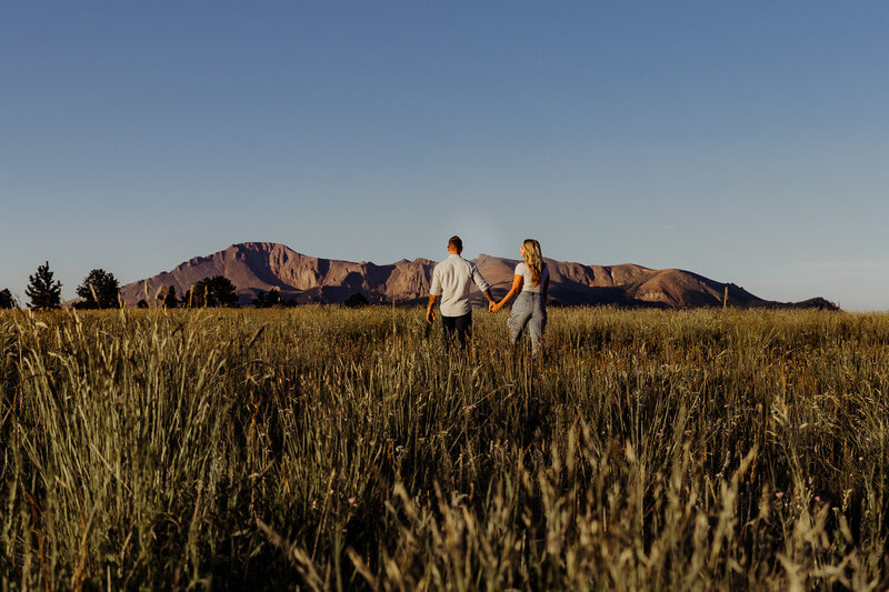 couple adventure session in flower field