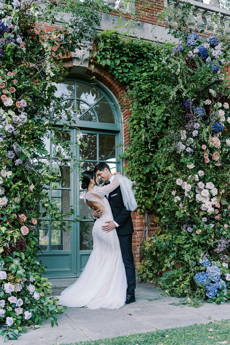 Bride and Groom smiling for a kiss