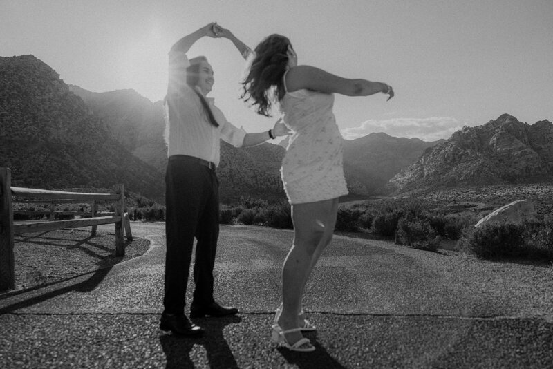 Couple who just got engaged dancing at The Red Rock Canyon in Nevada