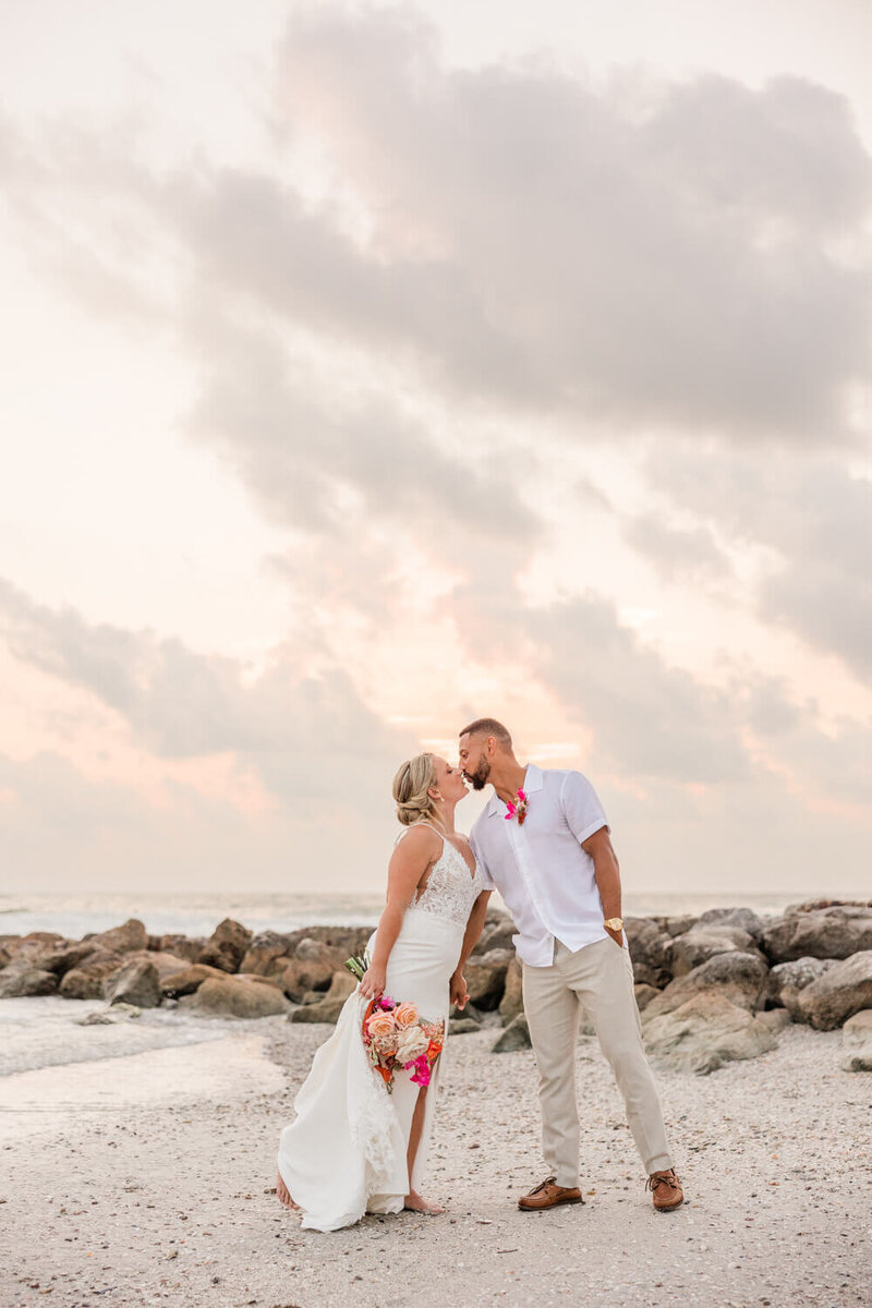 couple elopes on Sunset Beach in St. Pete, FL