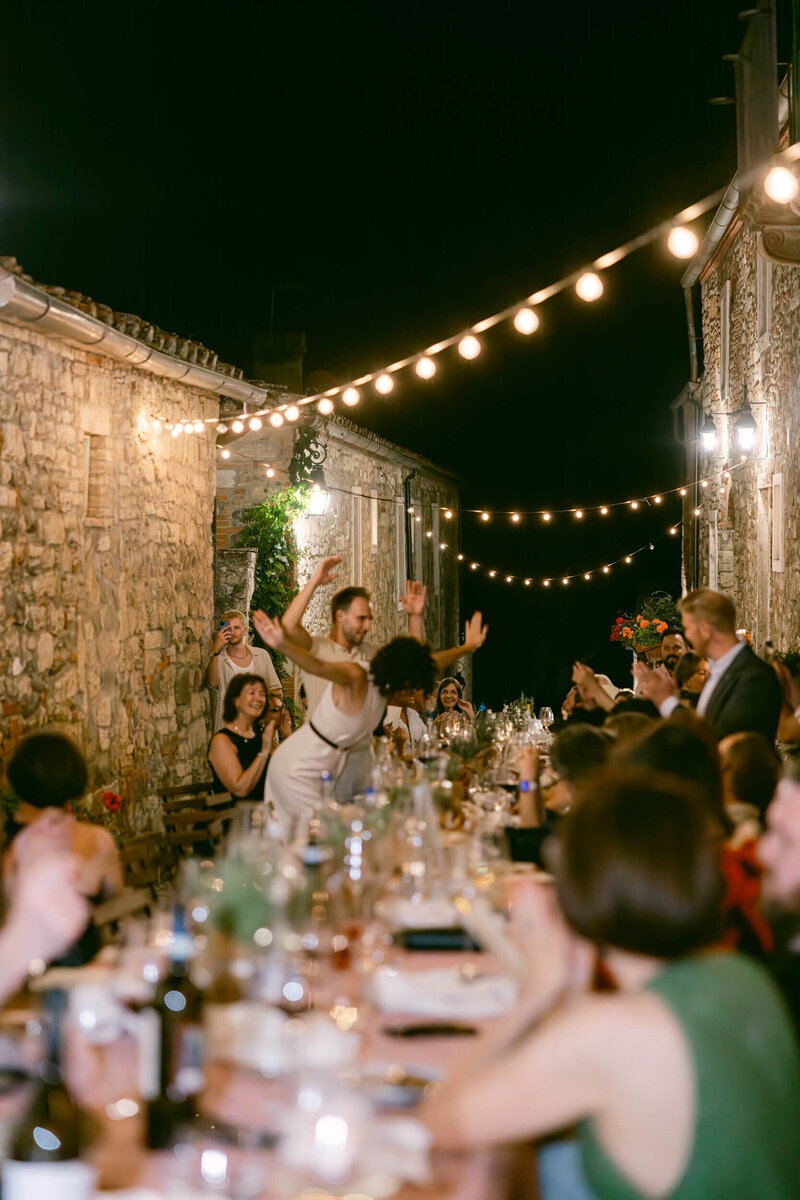 A wedding photo of cocktail hour at Laticastelli in Tuscany italy