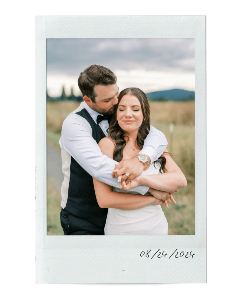 A polaroid image of a bride and groom embracing, representing a wedding in the event planning portfolio of Birdie June Events and Rentals.