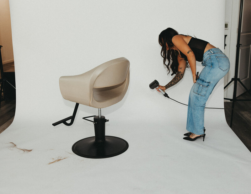 Hairstylists hugging and posing for the camera