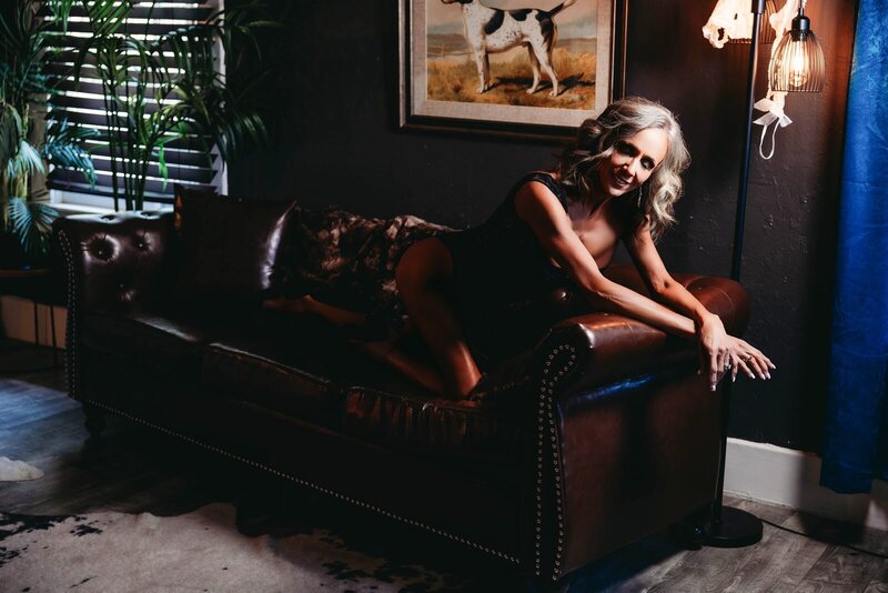 Leather couch boudoir photo by Ivory & Lace Studios in Kingman, Arizona
