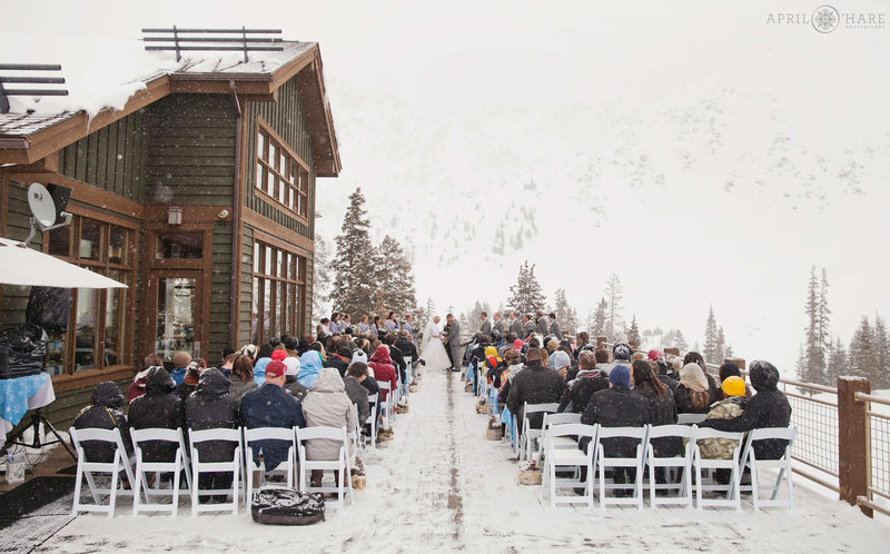 Snowy outdoor winter wedding at Arapahoe Basin Ski Area in Colorado