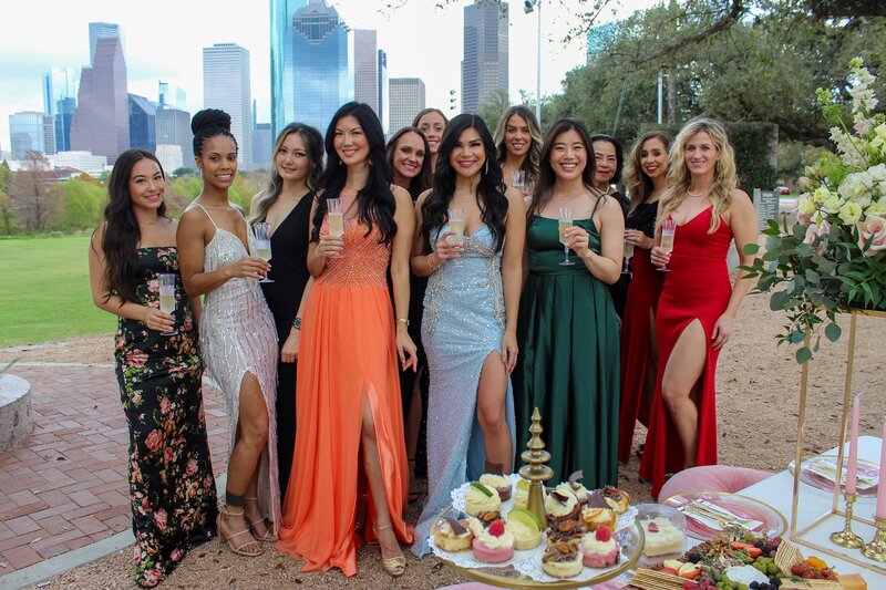 Women pose at picnic