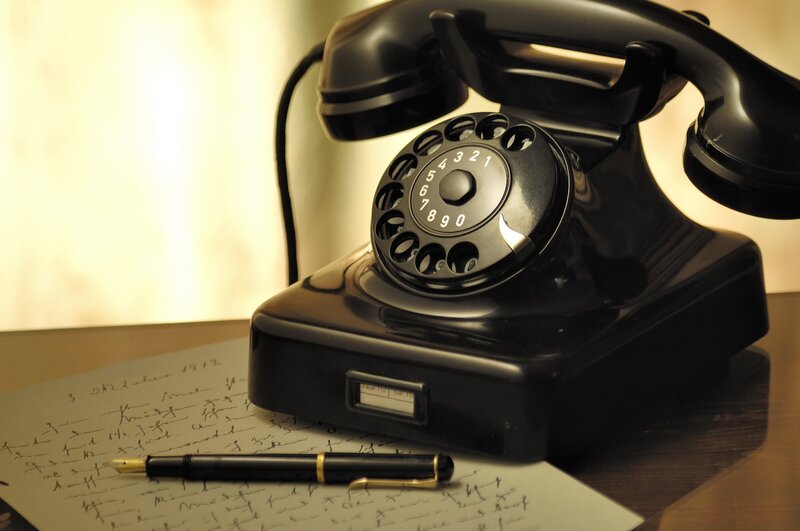 black-rotary-telephone-beside-ball-pen-on-white-printed-47319
