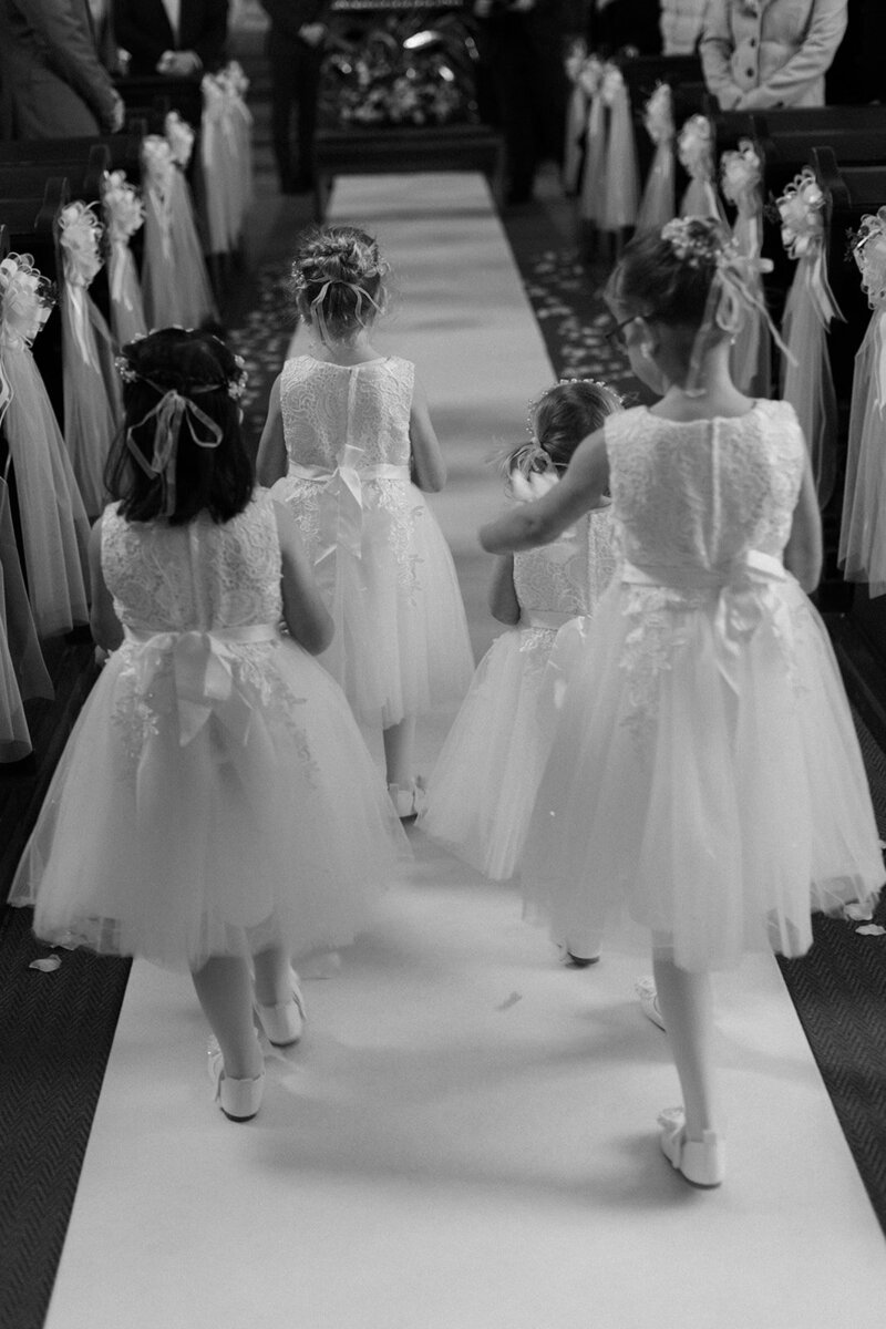 Luxury wedding in Europe – sophisticated bride in a modern wedding gown and groom in a timeless suit.