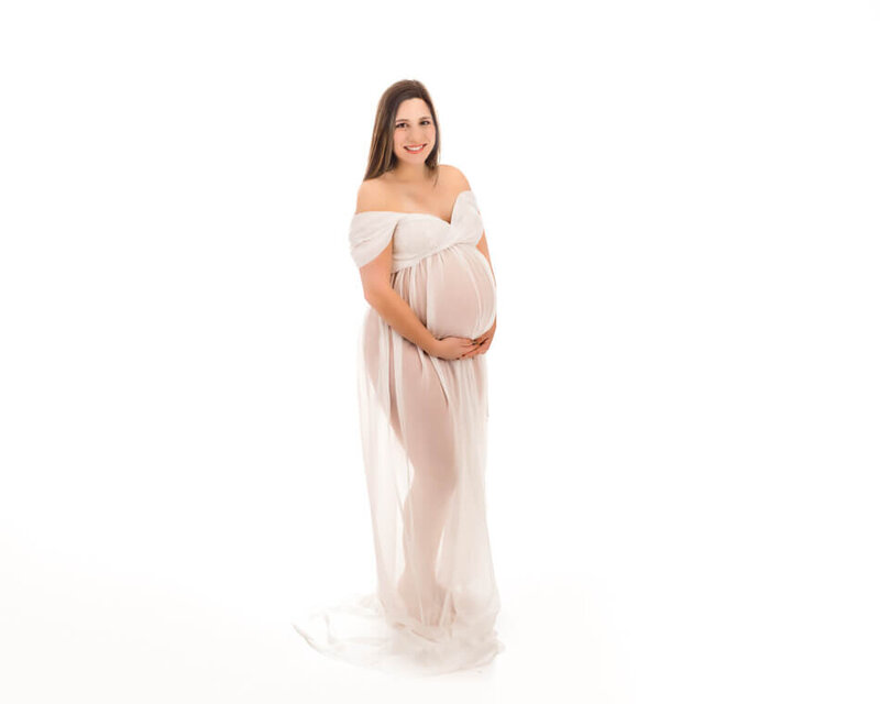 Beautiful pregnant lady on a white background.