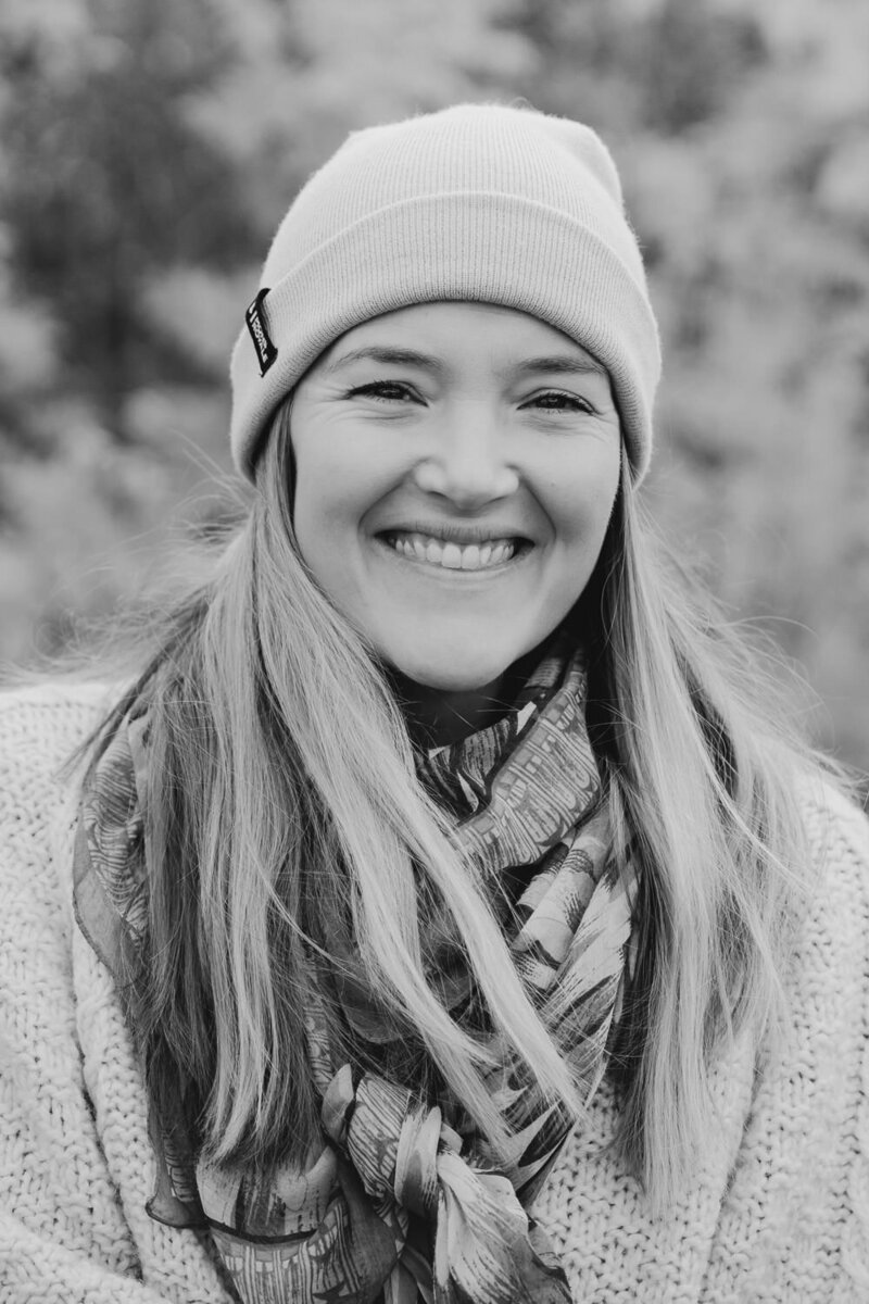 Woman with wind in her hair smiling