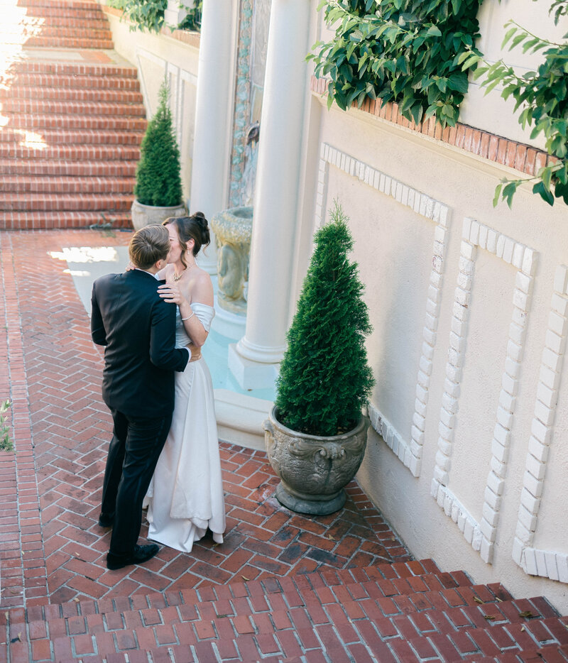 Wedding Photography in the Bay Area, bride and groom dancing next to a fountain