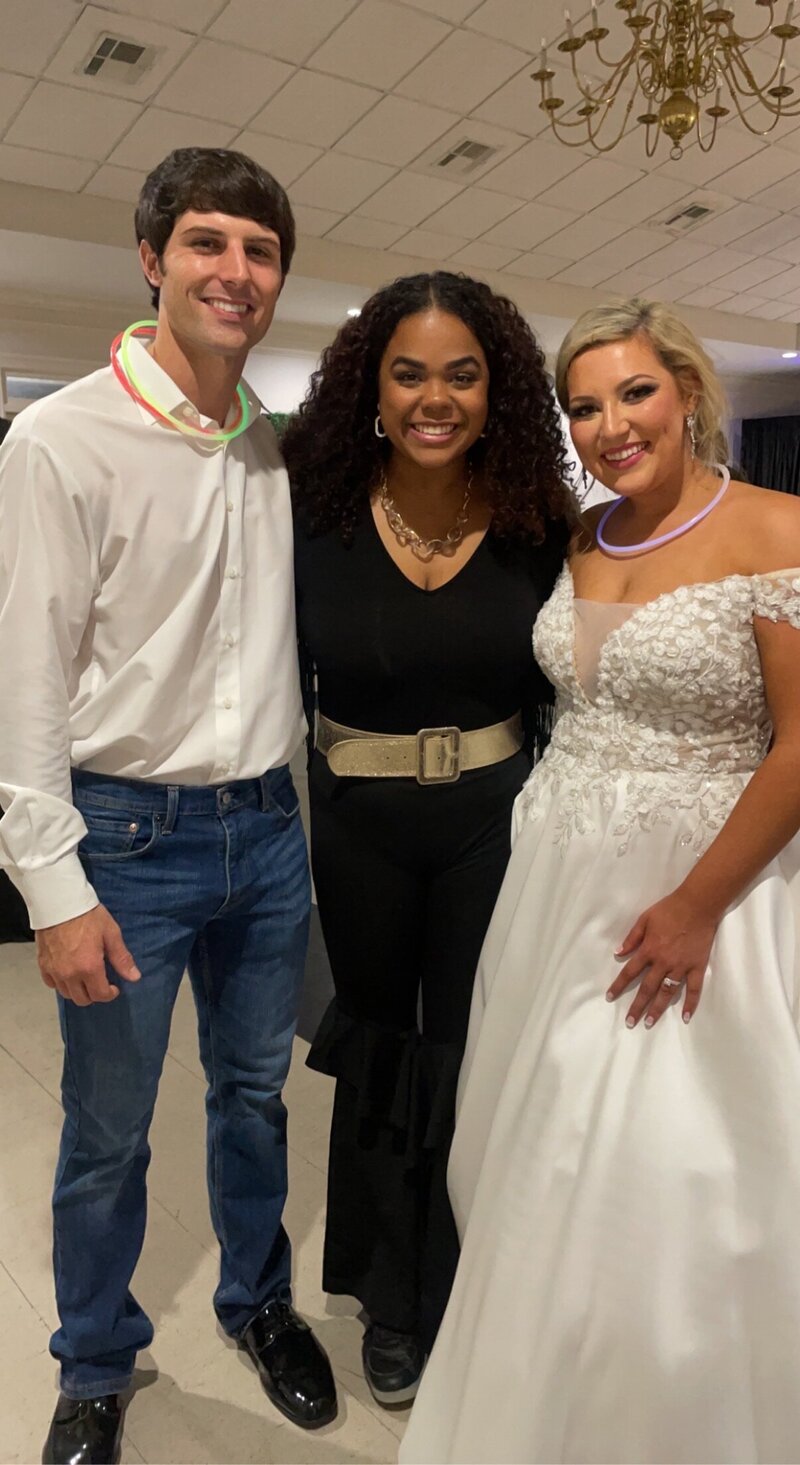 a Style Entertainment DJ with a bride and groom on their wedding day