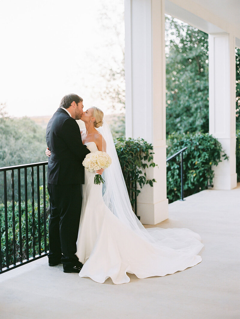 A  newly married couple and their guests celebrates the nuptials on Kendall point's idyllic staircase.