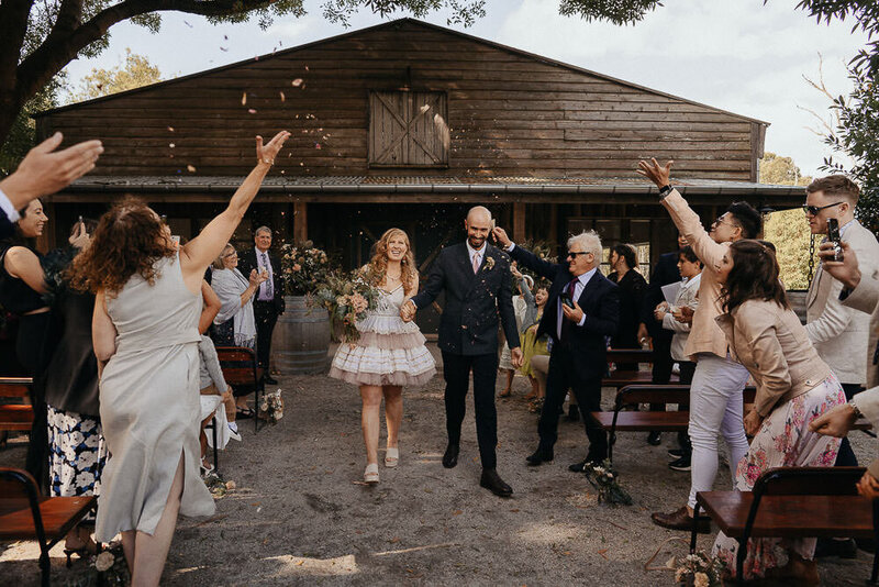 couple celebrating their marriage after wedding ceremony at the farm yarra valley