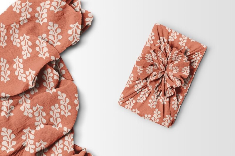 Romantic, sophisticated, vintage inspired print in warm salmon and pale pink showcase botanical pieces in a symmetrical flow