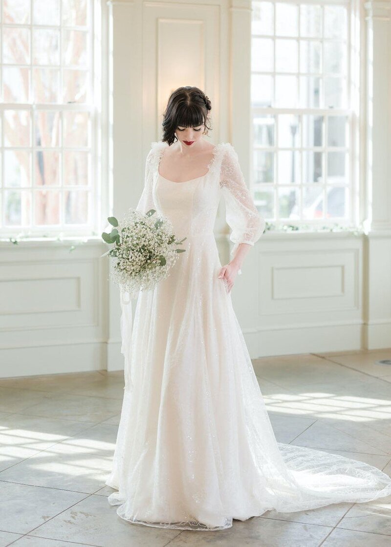 Gene wedding dress image  link to the Edith Elan stock bridal collections