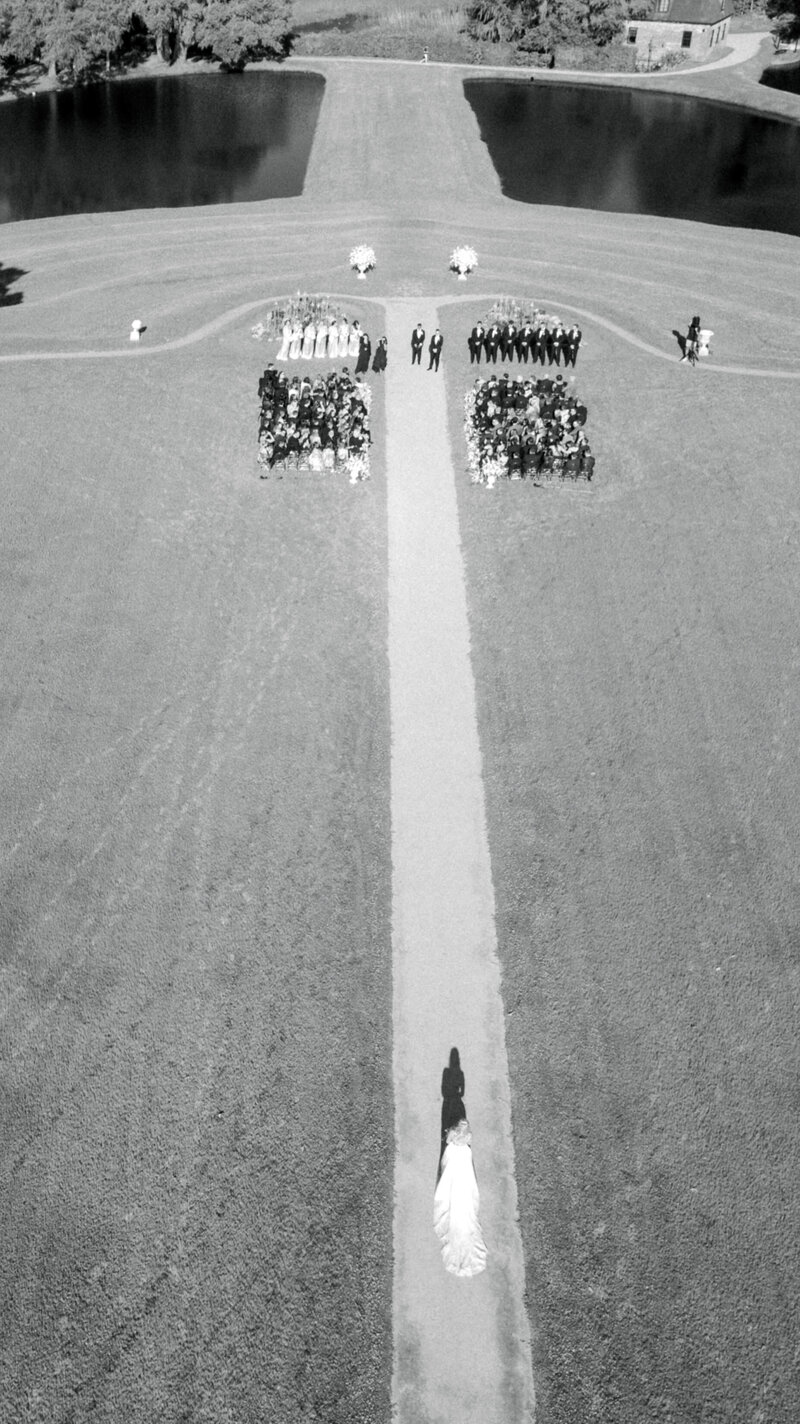 aerial photo of a bride walking down the aisle at Middleton Place