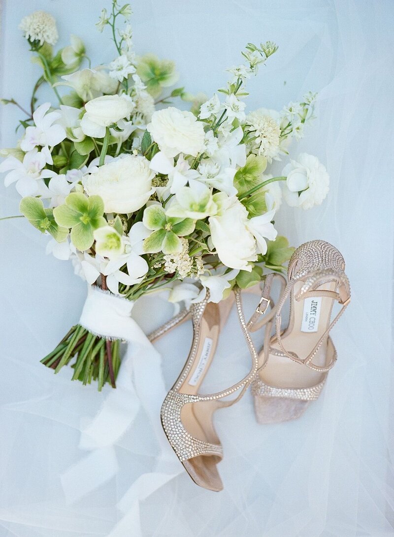 Wedding bouquet with brides jimmy choo shoes
