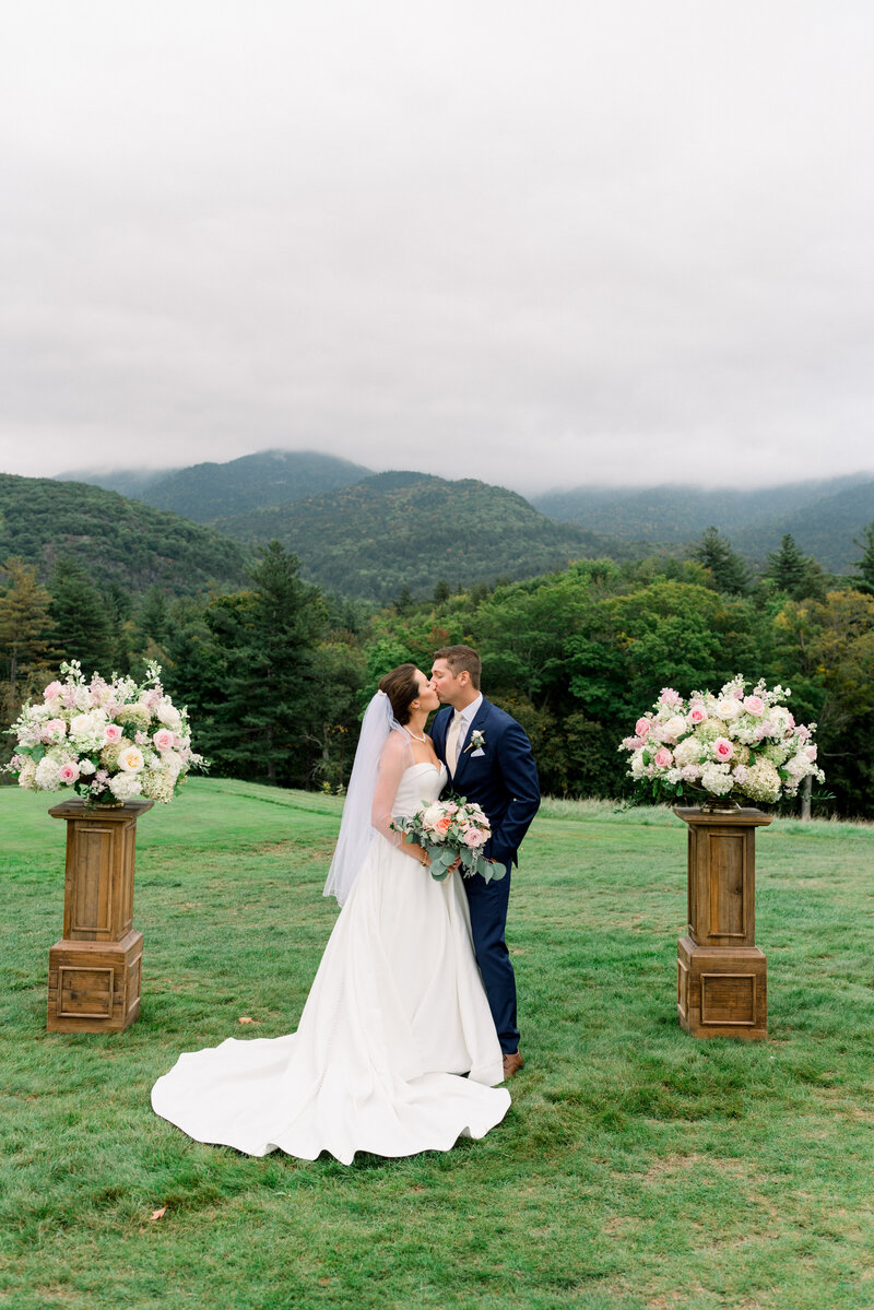 ausable club wedding ceremony overlooking giant mountain with misty mountains and beautiful photos