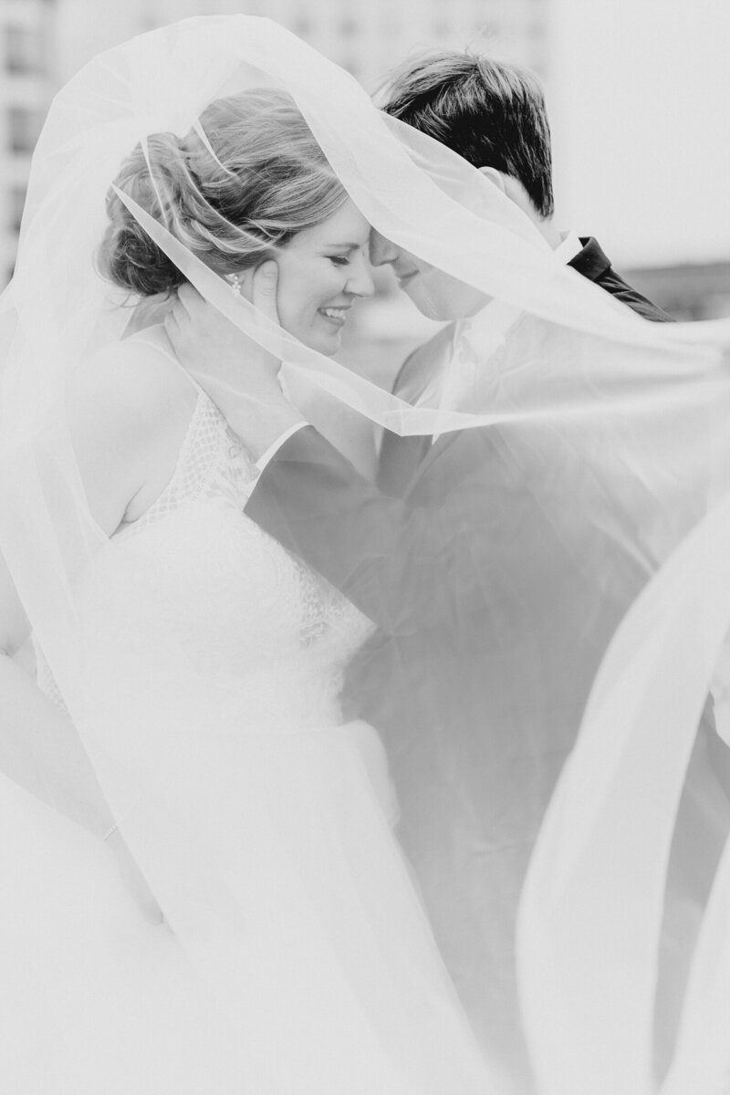 black and white wedding with cathedral veil