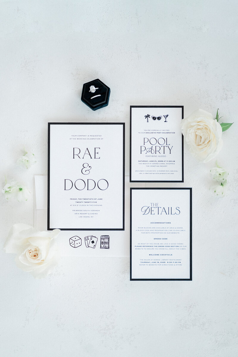 black wedding invitation with torn edges and gold foil lettering by belle azalee