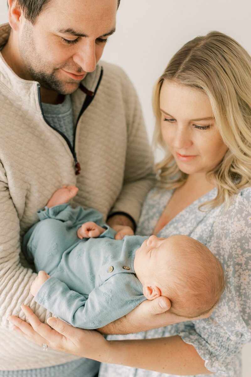 baby in blue newborn session in Lancaster, serving Harrisburg, Hershey, Exton, Downingtown