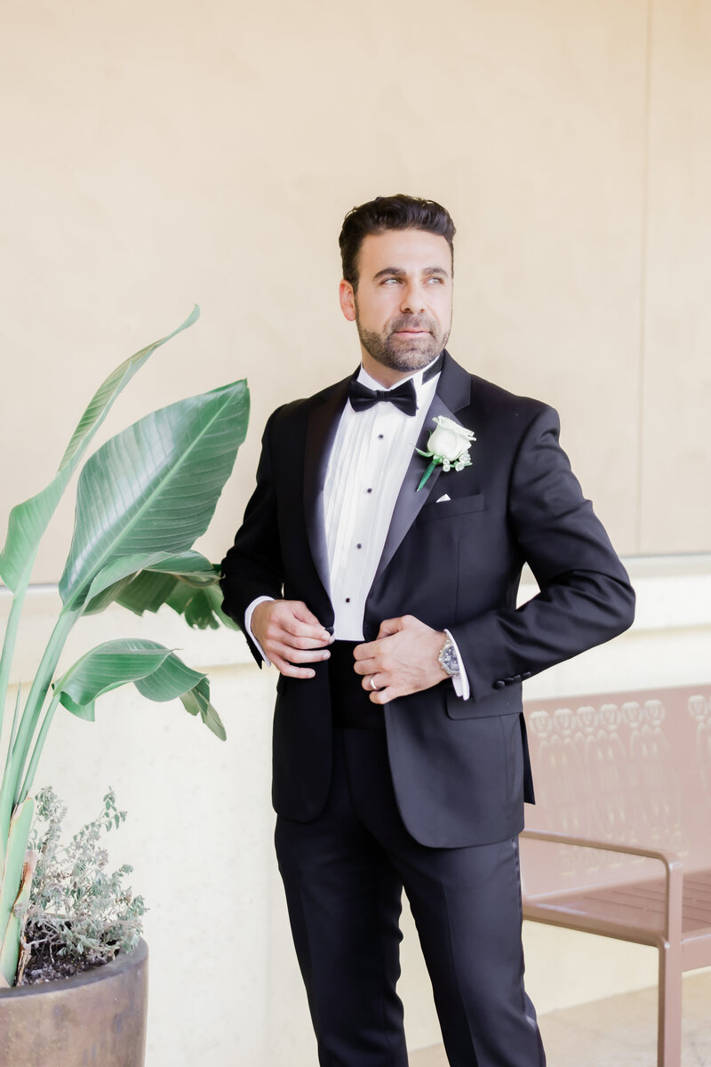 Groom portrait at a wedding at the four seasons Orlando by Florida wedding photographer.