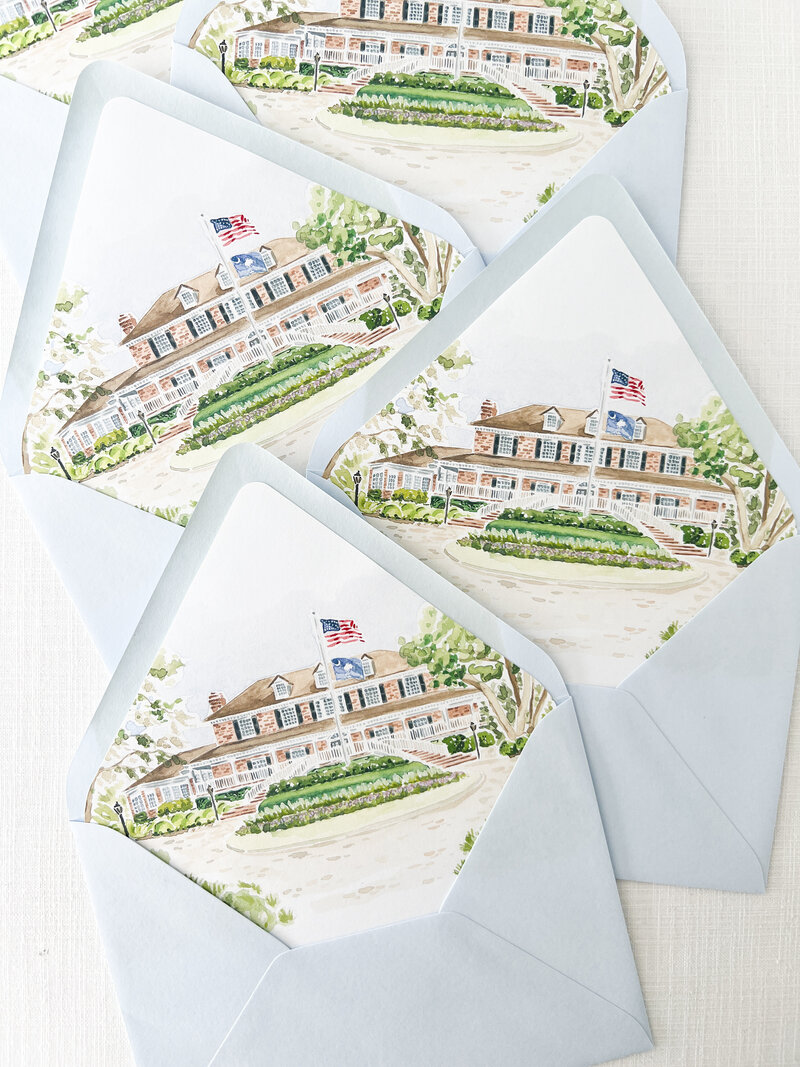 a wedding venue painting printed on an envelope liner