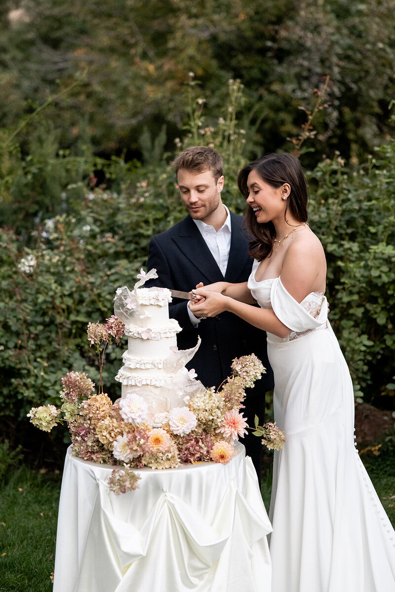 Candid photo of the bridal party celebrating outdoors, reflecting the joyous, emotionally rich experience promised by the luxury Montana wedding photographer