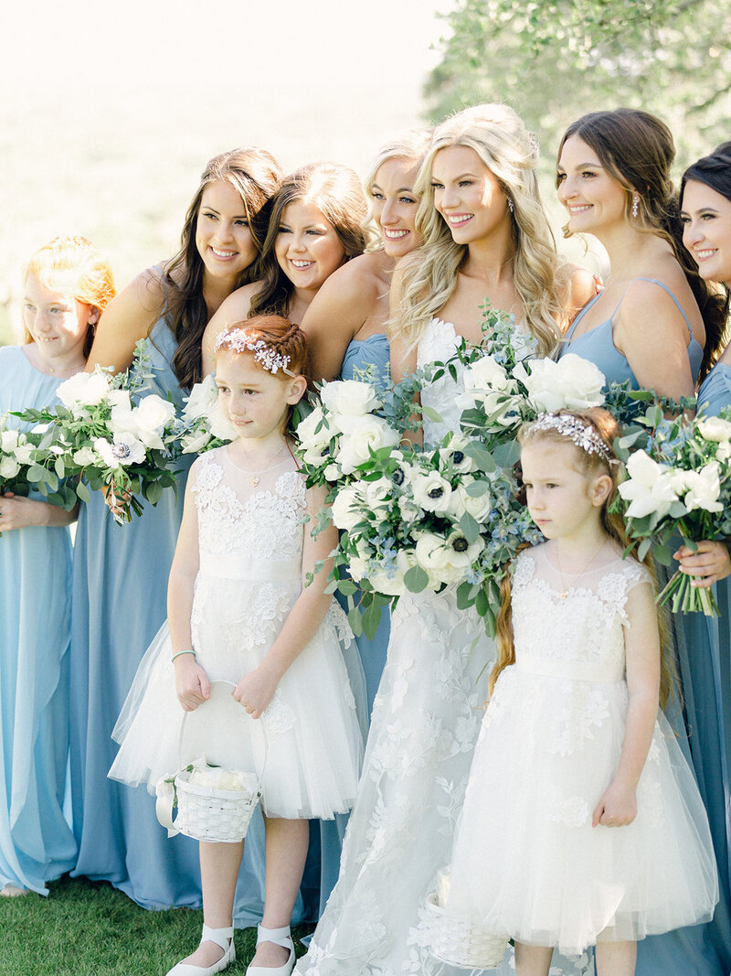 BRide with bridesmaids in light blue dresses