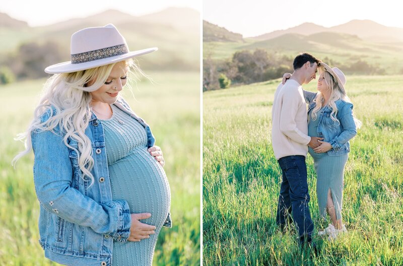 A couple looks lovingly at each other during their maternity session in a pretty field with rolling hills in the background
