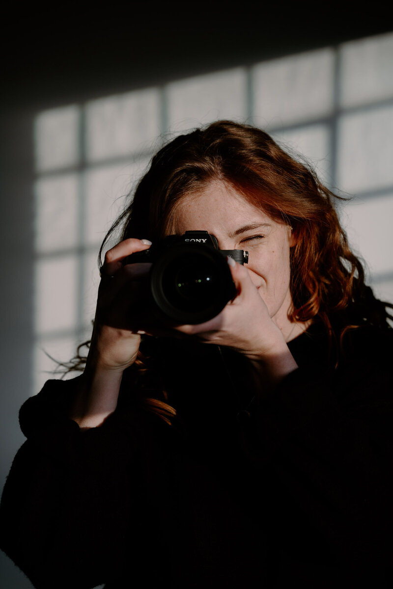 Image of personal fitness trainer sitting on road