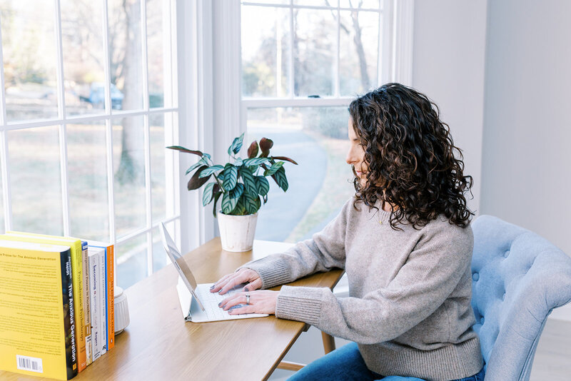 Jodi Berman at a desk in her office