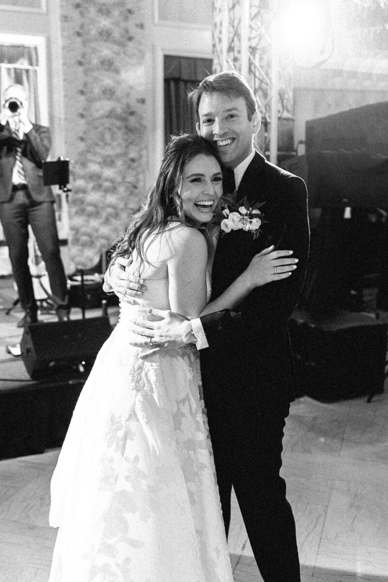 bride and groom holding each other at Chicago wedding