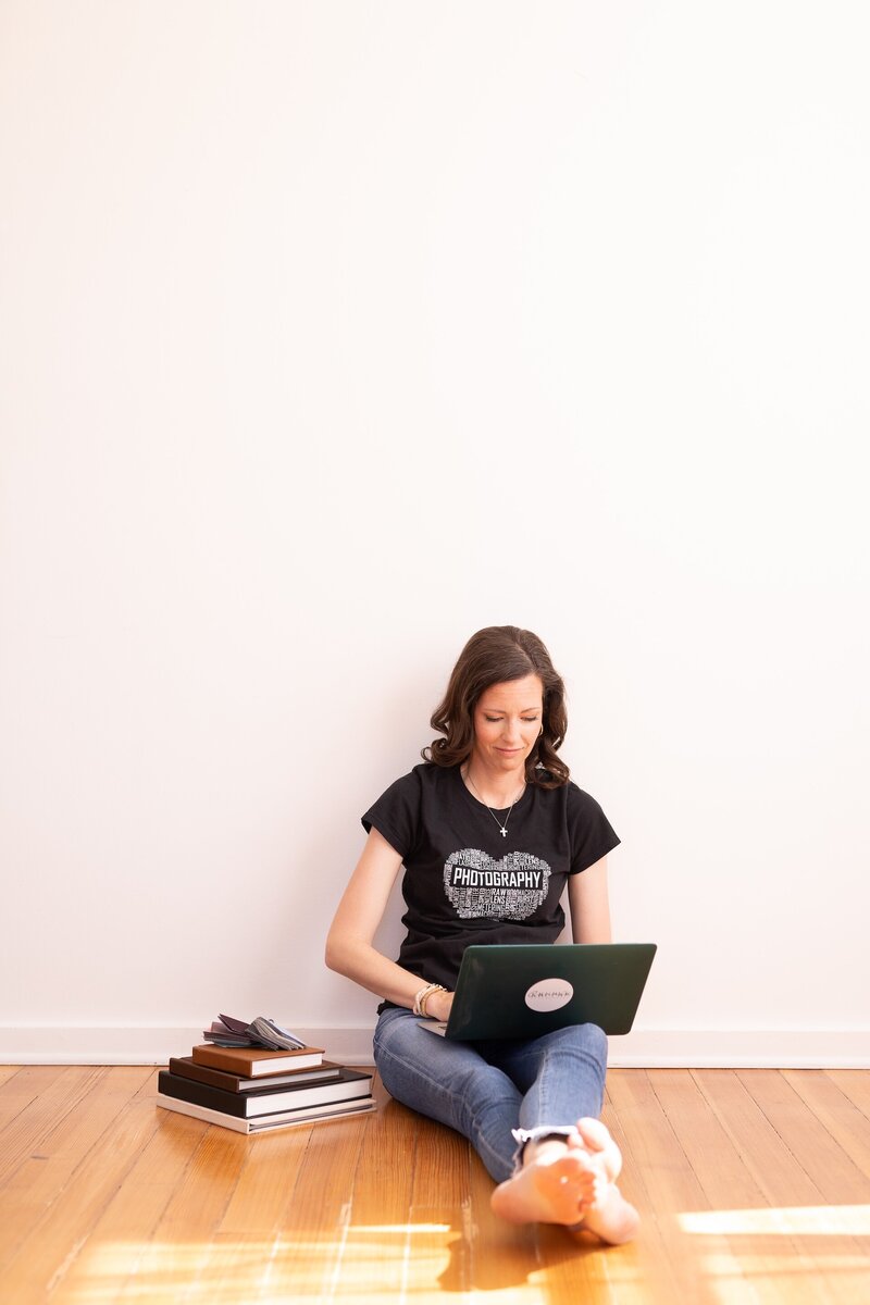 Carrie working on her laptop