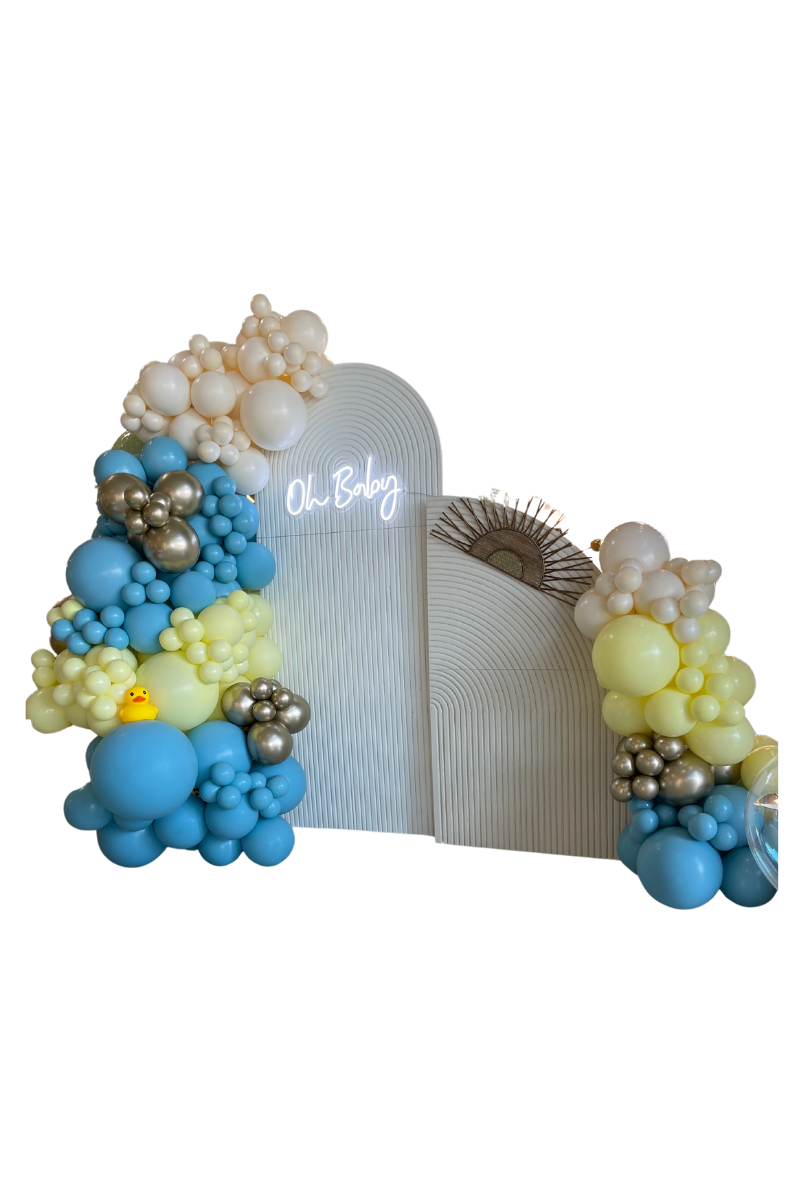 Two wooden backdrops with a beautiful split garland attached to them designed by Loononna, Orlando, FL