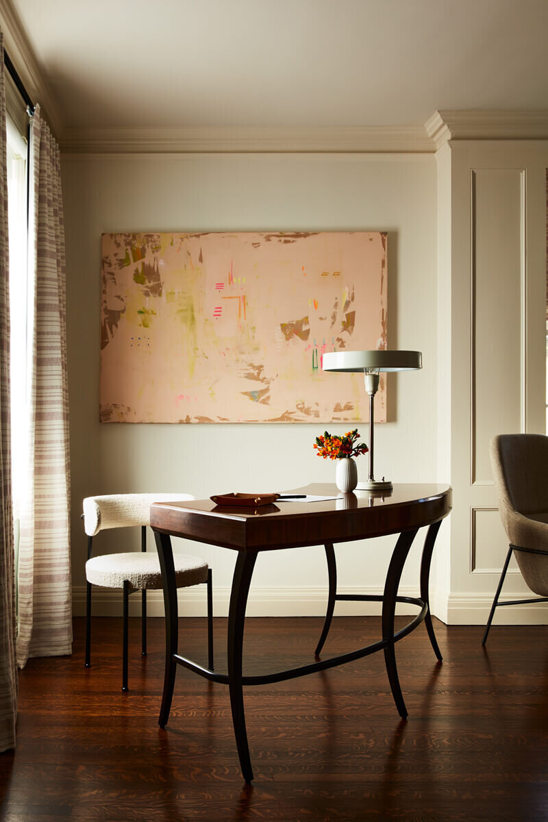 Interior decorators in Boston led a large-scale renovation of a historic home in Concord, blending original architecture with vintage furniture and fine art.