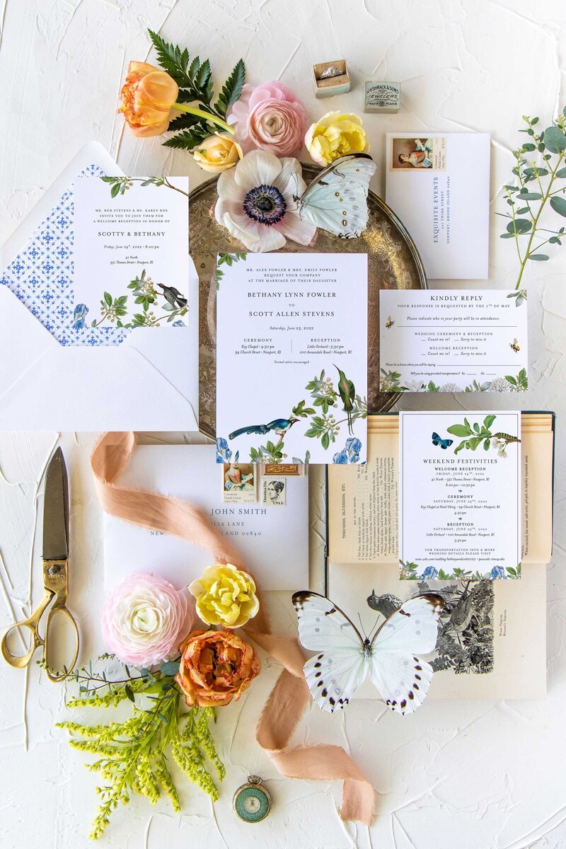 Botanical invitation suite flat lay with butterflies, flowers, scissors and ribbon, Invitation, details card, rsvp card. naturalist design