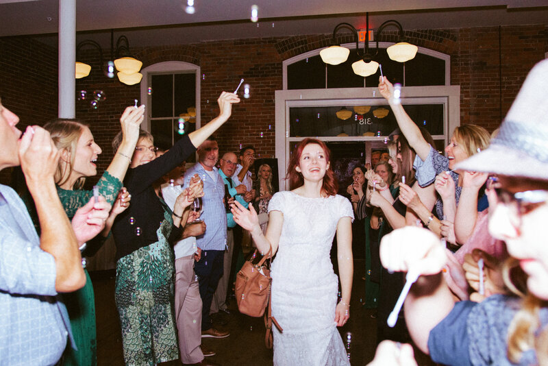 bride dancing in a crowd