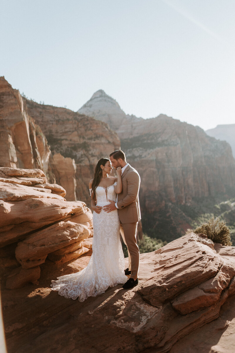 Bride and groom share a romantic moment during their destination elopement—an intimate and breathtaking wedding experience in a scenic location, planned by Watters & Co. Events
